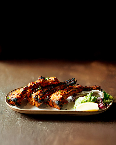 Chargrilled tandoori lamb chops with lemon and salad