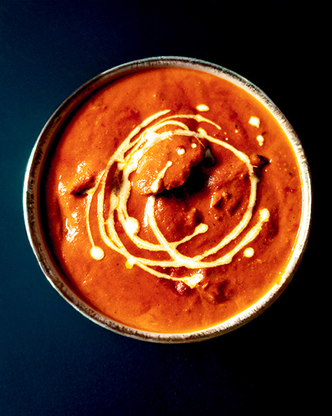 Creamy butter chicken finished with a swirl of cream