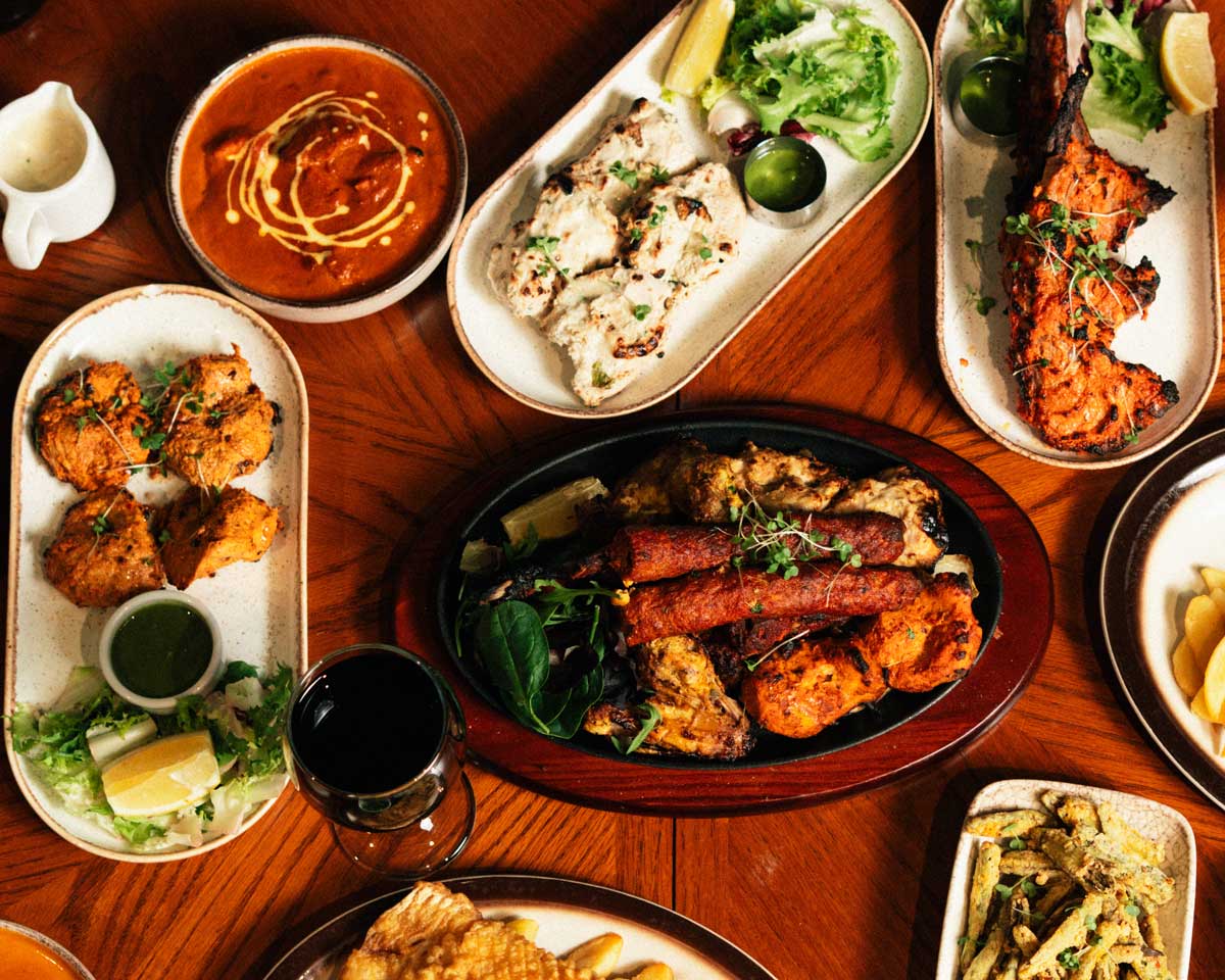 An abundant spread of tandoori grills, kebabs, curries and chutneys at Bombay Flavours