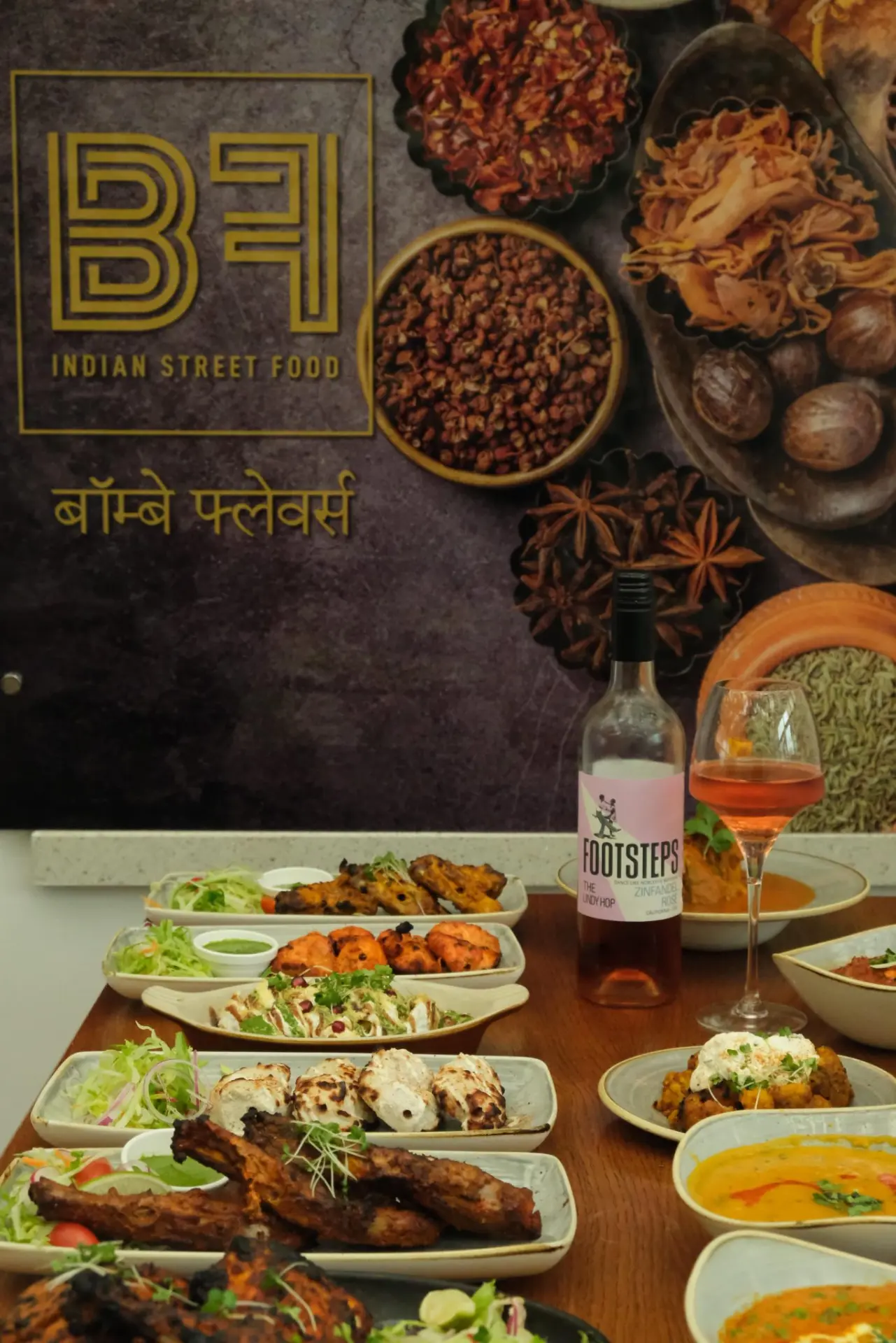A shared table of grills, curries and street-food plates